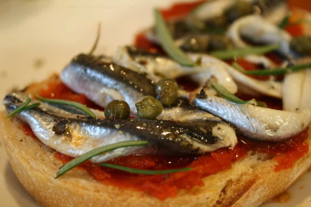 my favourite is simple - anchovies, capers, rosemary and salt and pepper - deliciousness.
